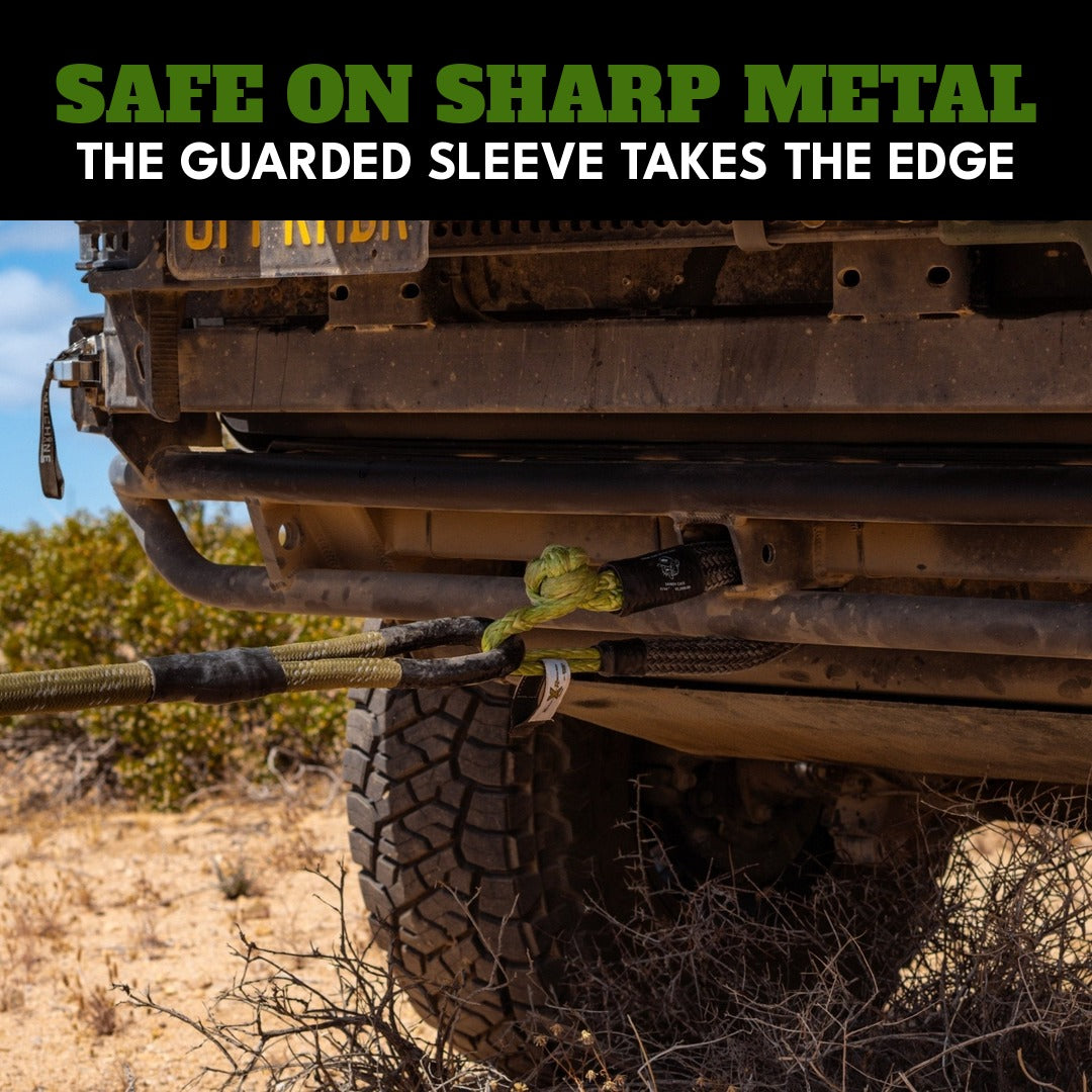 Safe on sharp metal: a Sandy Cats Hitch Hero soft shackle connected to a rear hitch in the desert