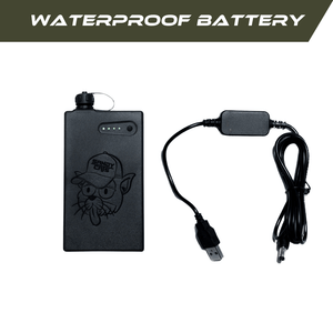Waterproof rechargeable TrailWash battery pack with Sandy Cats logo and USB charging cable shown side by side