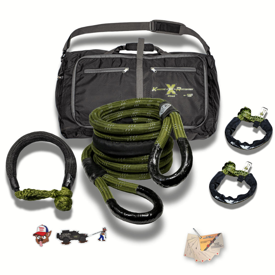 Sandy Cats Ultimate Recovery Kit laid out: kinetic rope, two soft shackles, a Hitch Hero, Off-Road Recovery Cards, stickers and carrying bag